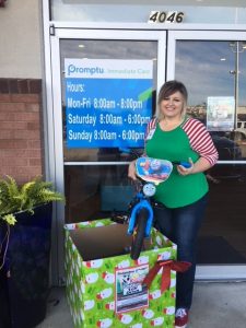 Jodi Clark with Toys and Box